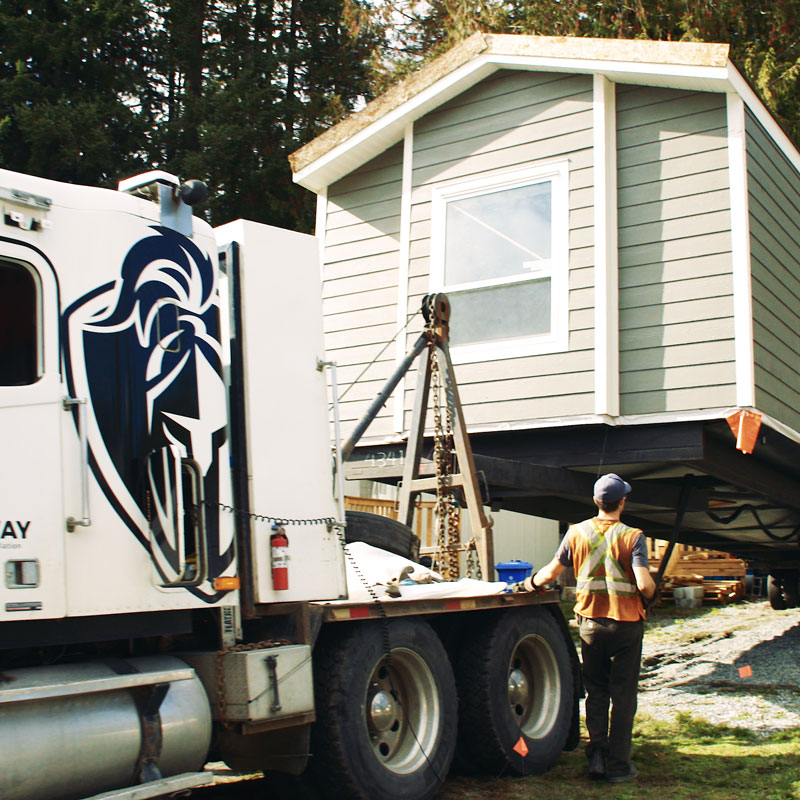 Mobile home being installed onsite in mobile home park